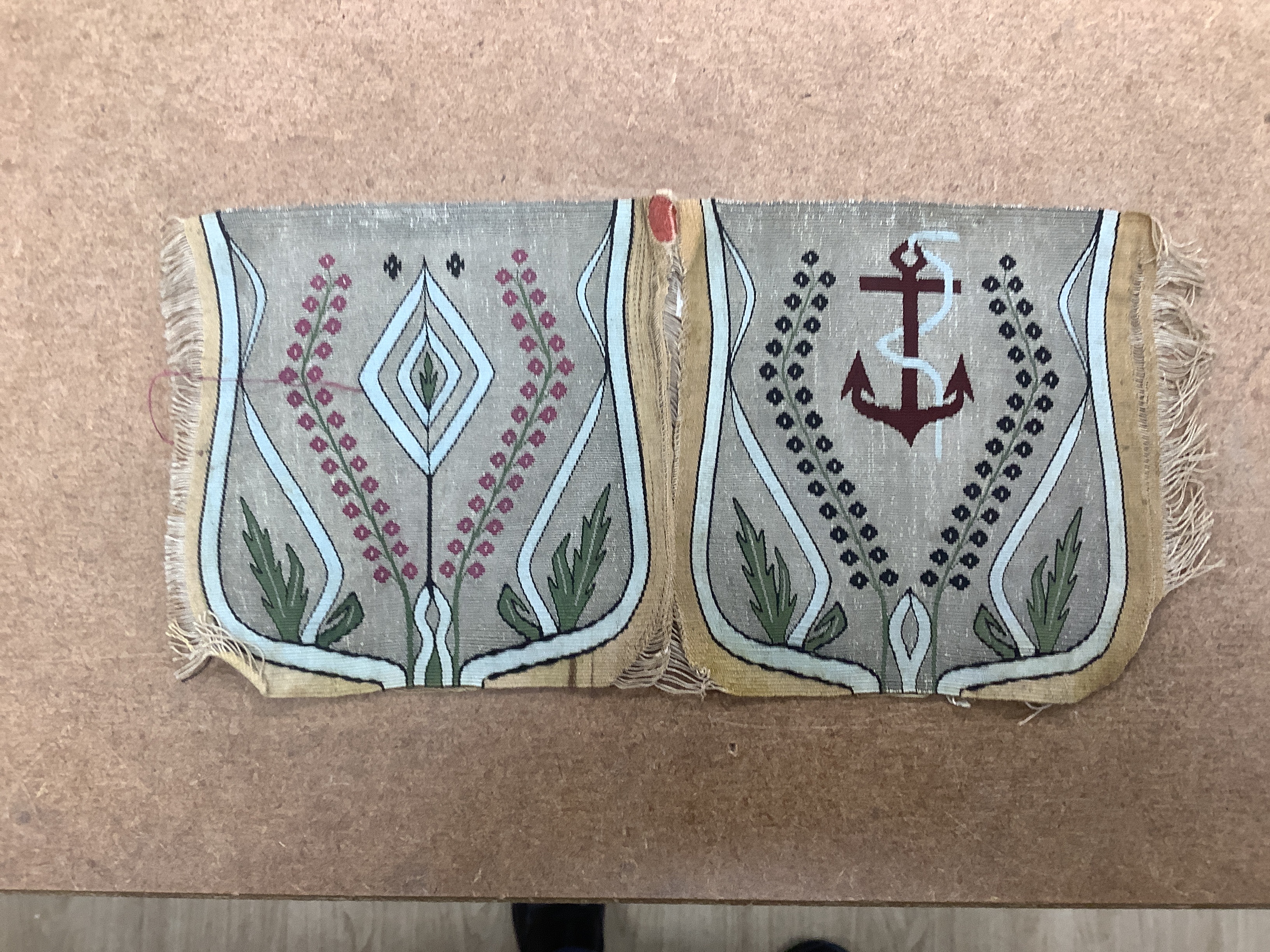 An 18th century American leather misers purse dated 1793, an unused finely woven tapestry, an early 19th century bead worked misers purse, longest misers purse 48cm